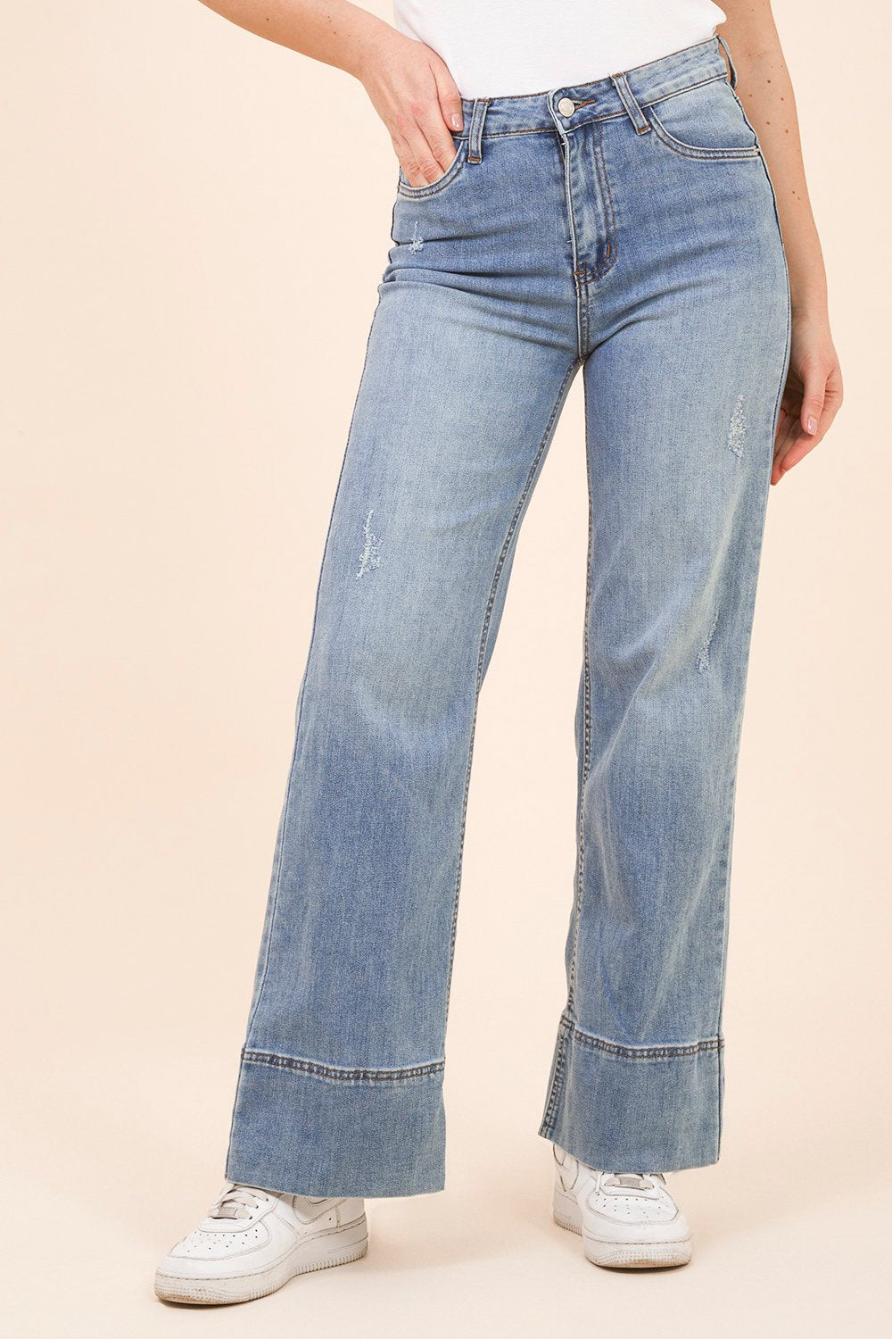 Jeans a Gamba Larga con Risvolto