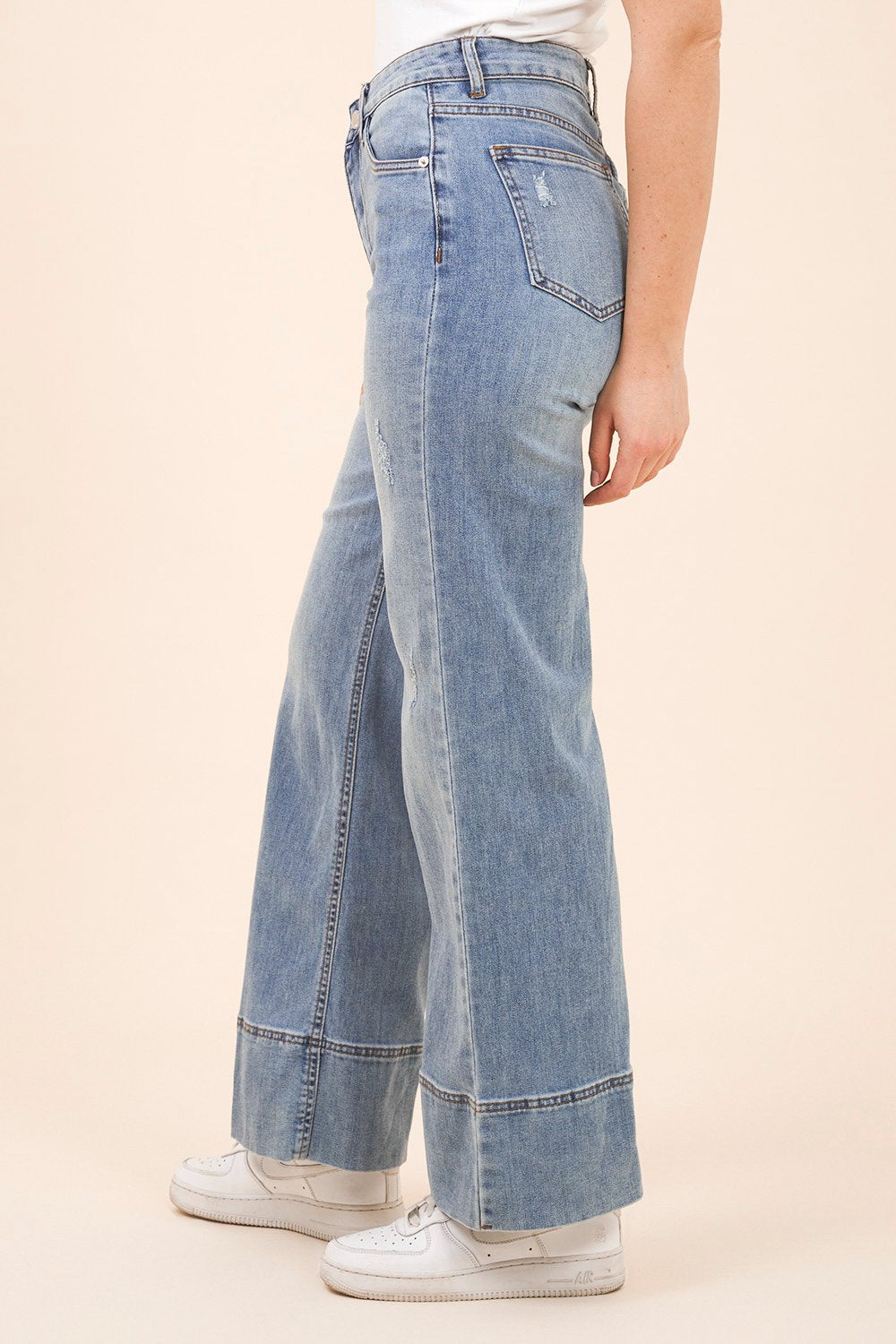 Jeans a Gamba Larga con Risvolto