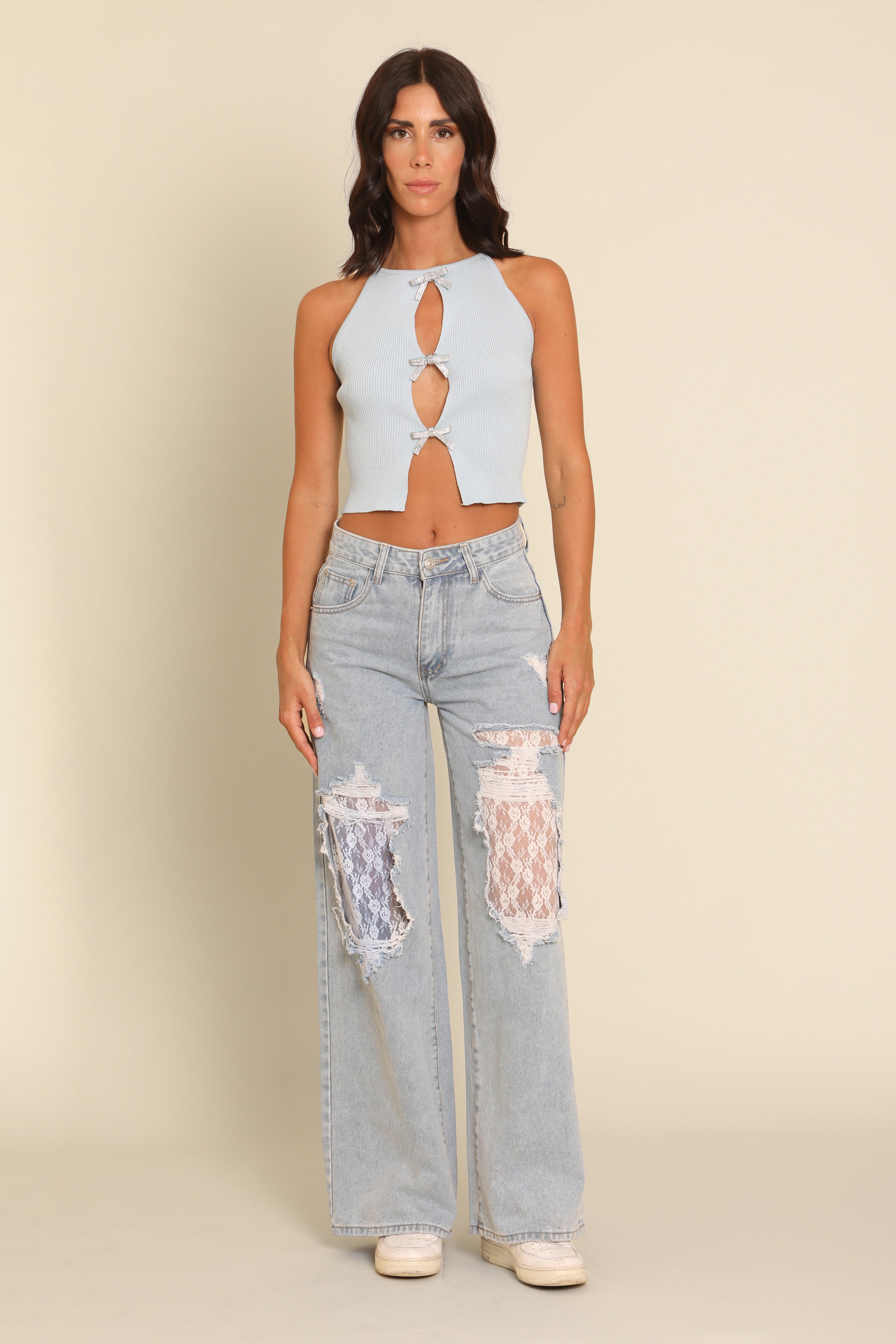 Jeans with white lace details